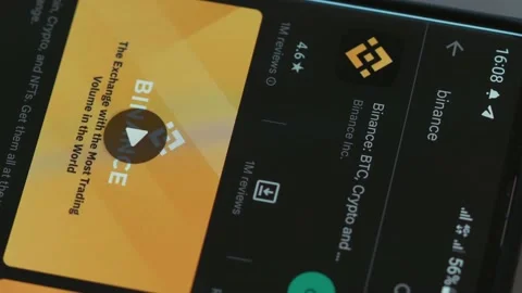 Rotating phone showing Binance  app (Cryptocurrency Exchange and trade ) Stock Footage 230613102