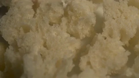 Rotating Piece of Wheat White Bread 스톡 동영상 168642401