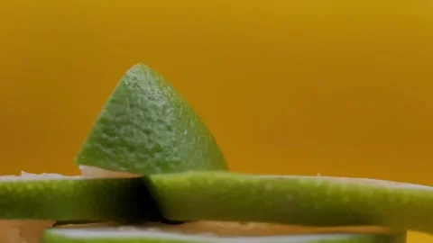 Rotating pieces of green grapefruit. Stock Footage 291517907
