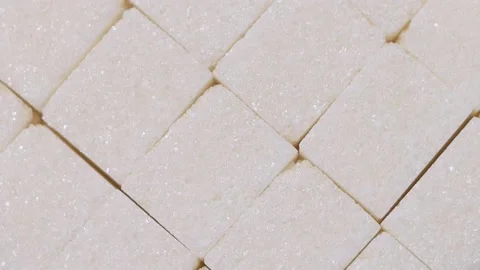 Rotating pieces of refined sugar. Stock Footage 148075605