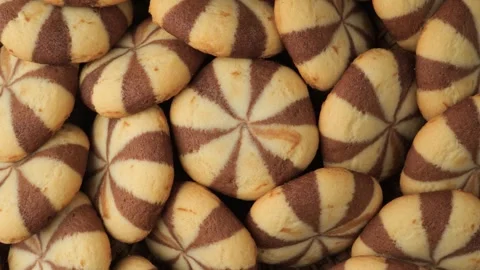 Rotating pile of chocolate and vanilla cookies Stock Footage 344915175