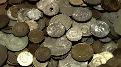 Rotating a pile of coins Stock Footage 1000180