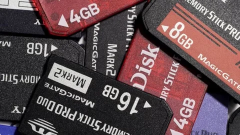 Rotating Pile Of Memory Stick Pro Duo Cards Stock Footage 332515726