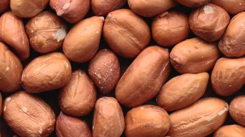 Rotating pile of raw peanuts Video stock 119396787