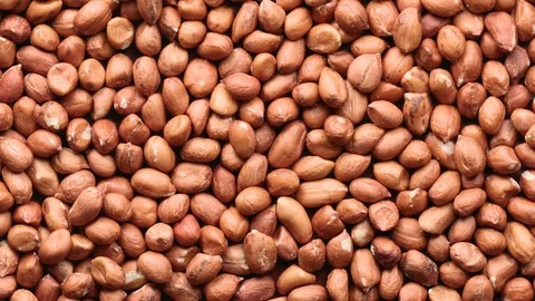 Rotating pile of raw peanuts Video stock 119398399