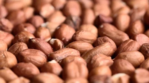 Rotating pile of raw peanuts Stock Footage 119402538