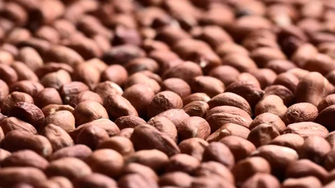 Rotating pile of raw peanuts Stock Footage 119402843