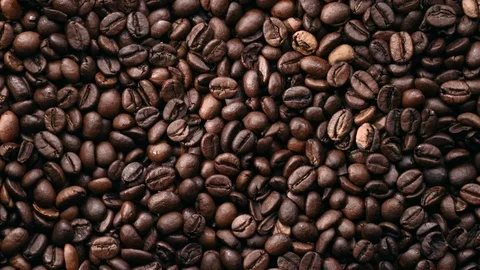 Rotating pile of roasted coffee beans Stock Footage 119291576