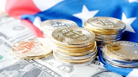Rotating piles of cryptocurrency coins on dollars, american flag Stock Footage 88424703