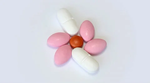 Rotating pills on a white background Stock-Footage 35520435