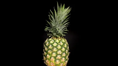 Rotating pineapple in a circle Stock Footage 119954613