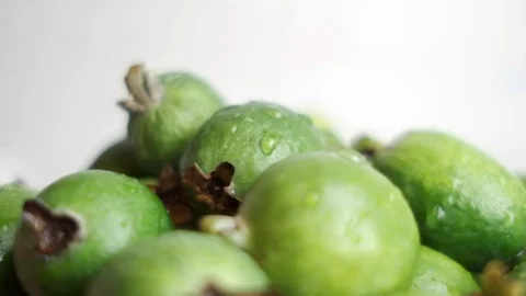 Rotating plate with feijoa berries Stockbeeldmateriaal 119721430