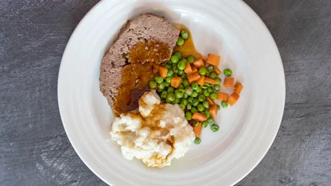 Rotating plate of Meatloaf and Mashed Potatoes Stock Footage 218467951