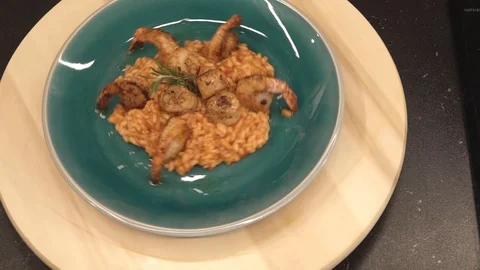 Rotating plate with risotto overhead Stock Footage 112128120