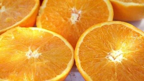 Rotating plate with slices of oranges Stock Footage 74051816