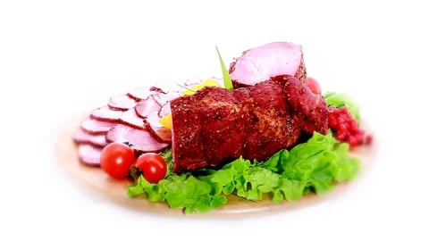 Rotating Plates Of Meat Stock Footage 76622915