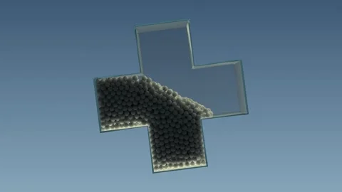 Rotating plus sign container filling with small dark balls slowly Stock Footage 327593956