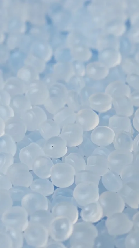 Rotating polyethylene granules create clean macro texture for healthcare and Stock Footage 347048529