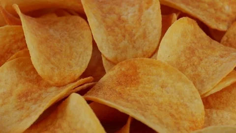 Rotating potato chips close up Stock Footage 78499941