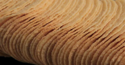 Rotating potato chips close up Stock Footage 99812041