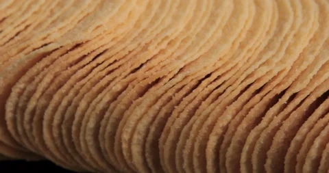 Rotating potato chips close up Stock Footage 99812211