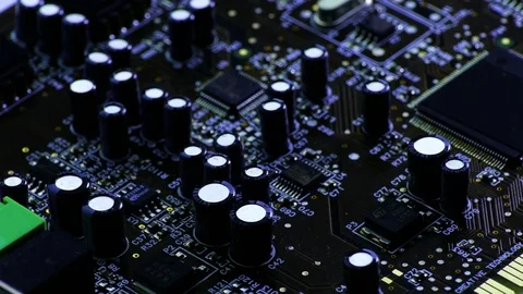 Rotating Printed Circuit Board With Microprocessors and Capacitors, Partially Video stock 77050457