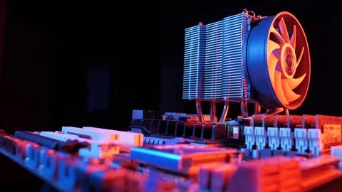 Rotating processor CPU fan installed on the motherboard on a black background Stock-Footage 107004235