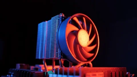 Rotating processor CPU fan installed on the motherboard on a black background Stock-Footage 107004293