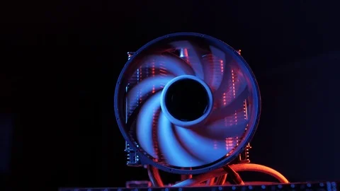 Rotating processor CPU fan installed on the motherboard on a black background Stock-Footage 107004329