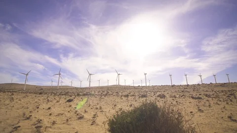 Rotating propellers of wind turbines in the desert Stock Footage 85817799