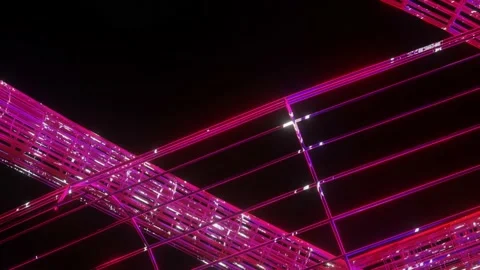 Rotating purple three-dimensional lattice rings with a luminous texture. looped  Stock Footage 153486176