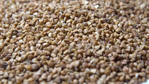 Rotating raw buckwheat close-up 4k Video stock 101180203