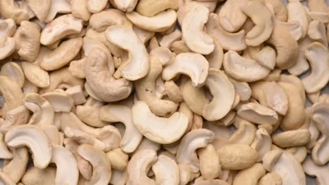 Rotating Raw Cashew Nuts Top View Macro Background Healthy Snack 4K Video Stock Footage 340753168