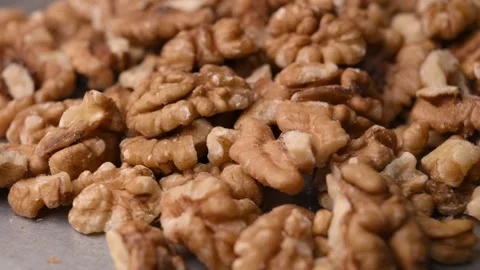 Rotating Raw Walnut Kernels Macro Angled Top View Healthy Food 4K Video Stock Footage 340751132