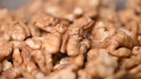 Rotating Raw Walnut Kernels Macro Angled Top View Healthy Food 4K Video Stock Footage 340753870