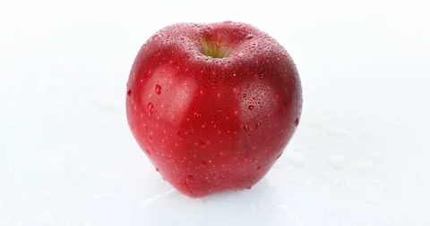 Rotating red apple on white background Stock Footage 102255937
