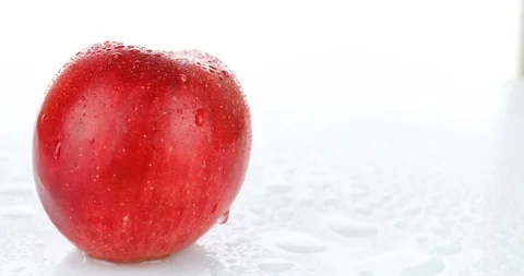 Rotating red apple on white background Stock Footage 102258980