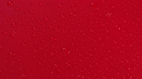 Rotating red background with water drops top view Stock Footage 197376904