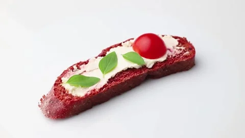 Rotating of red beet bread sandwiches with cream cheese and tomatoes. Stock Footage 137661082