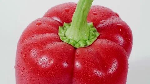 Rotating red bellpepper on white background Stock Footage 147284315