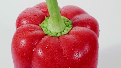 Rotating red bellpepper on white background Stock Footage 147284355