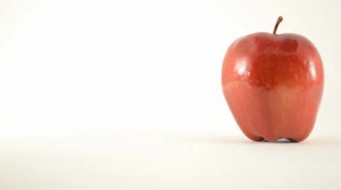 Rotating Red Delicious Apple Against White - Dolly Left Stock Footage 24471159