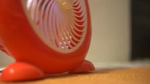 A rotating red fan Video stock 300427232
