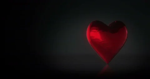 Rotating Red Heart On A Black Background Stock Footage 72424857