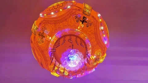 The rotating red lanterns shine brightly Video stock 329141364