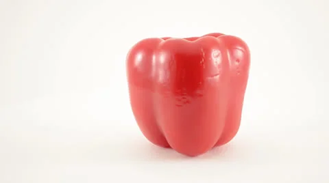 Rotating Red Pepper Against White - Dolly Right Stock Footage 22803321