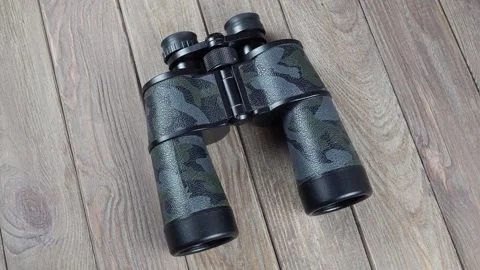 Rotating Retro Binoculars From Above On The Background. Stock Footage 234547169
