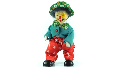 Rotating Retro Clown Doll On A White Background. Stock Footage 220125449