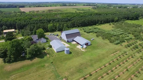 Rotating right around orchard barn Stock Footage 90257102