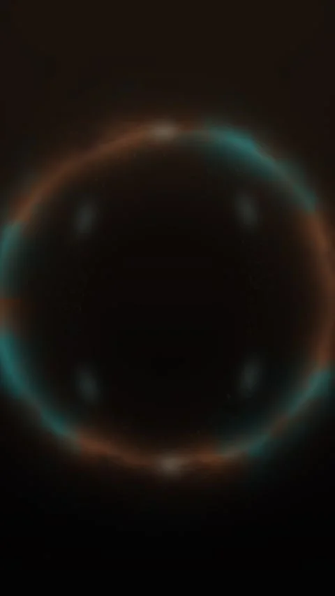 Rotating ring glows against black background Stock Footage 330561667